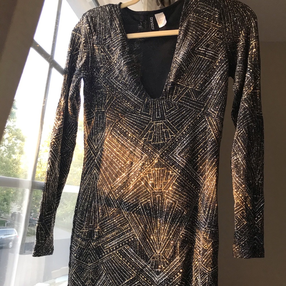 Sparkly deep v cut dress